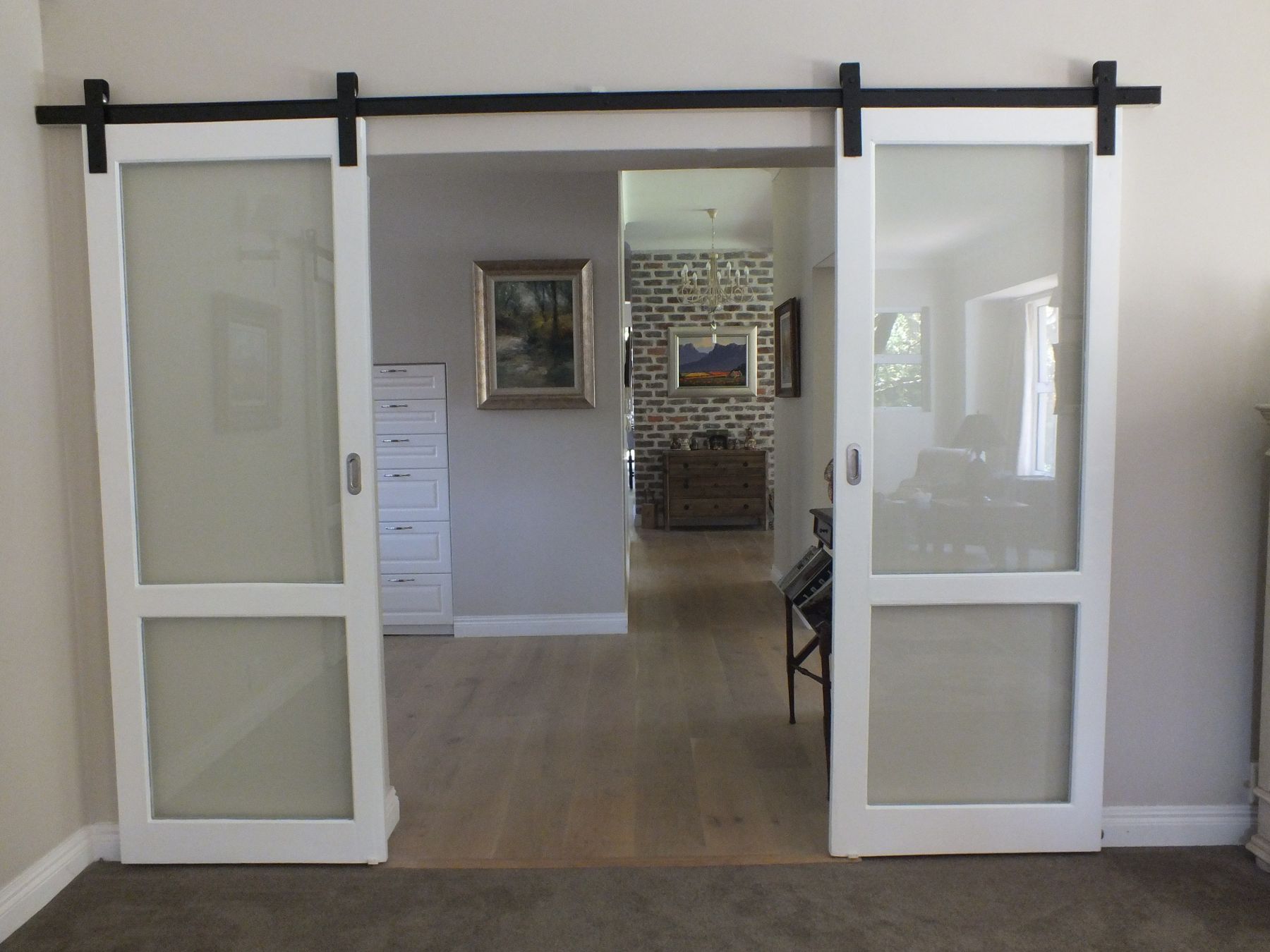 Sliding glazed barn doors — House in Atholl