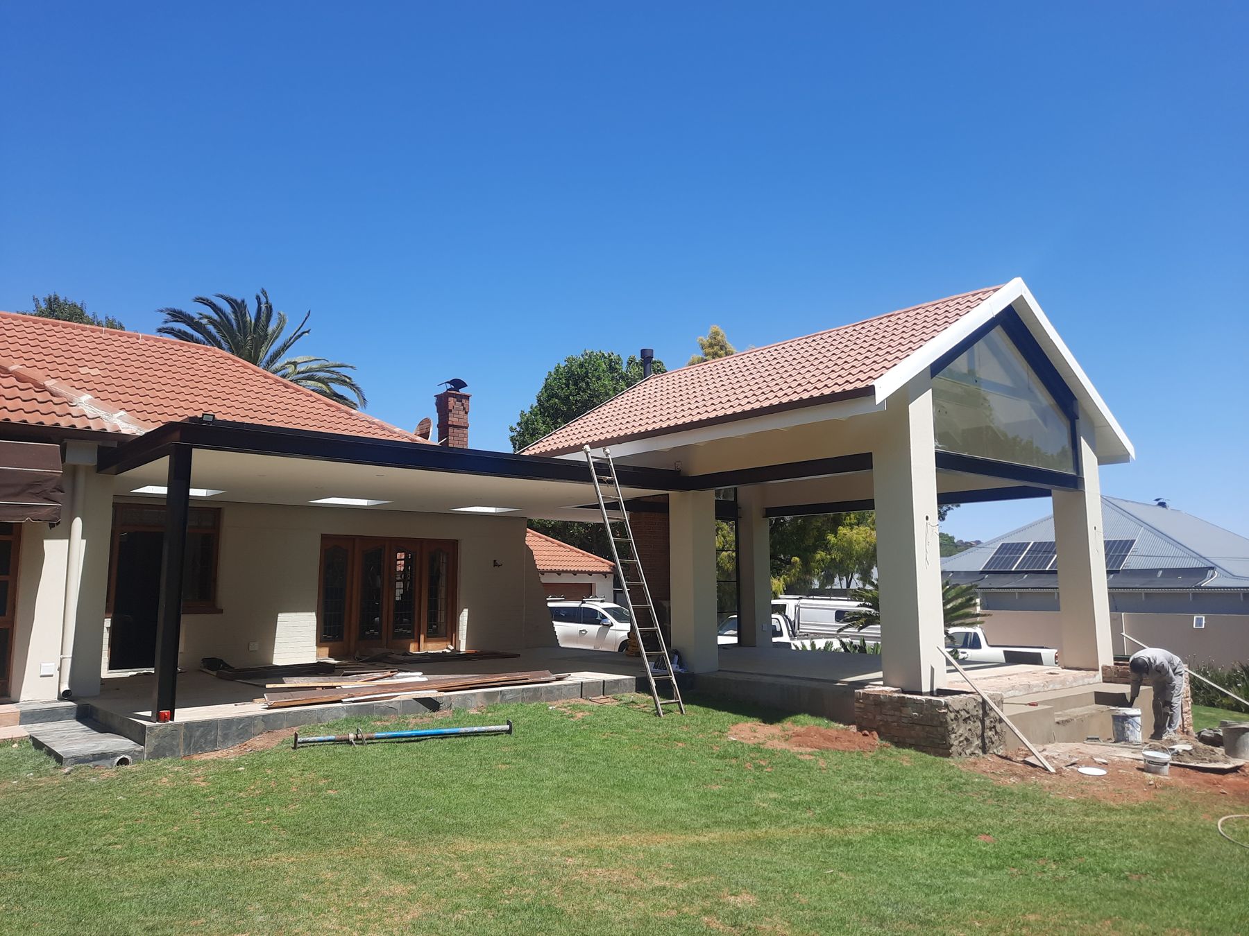 A Saxonwold addition under construction — the new gable frame in place
