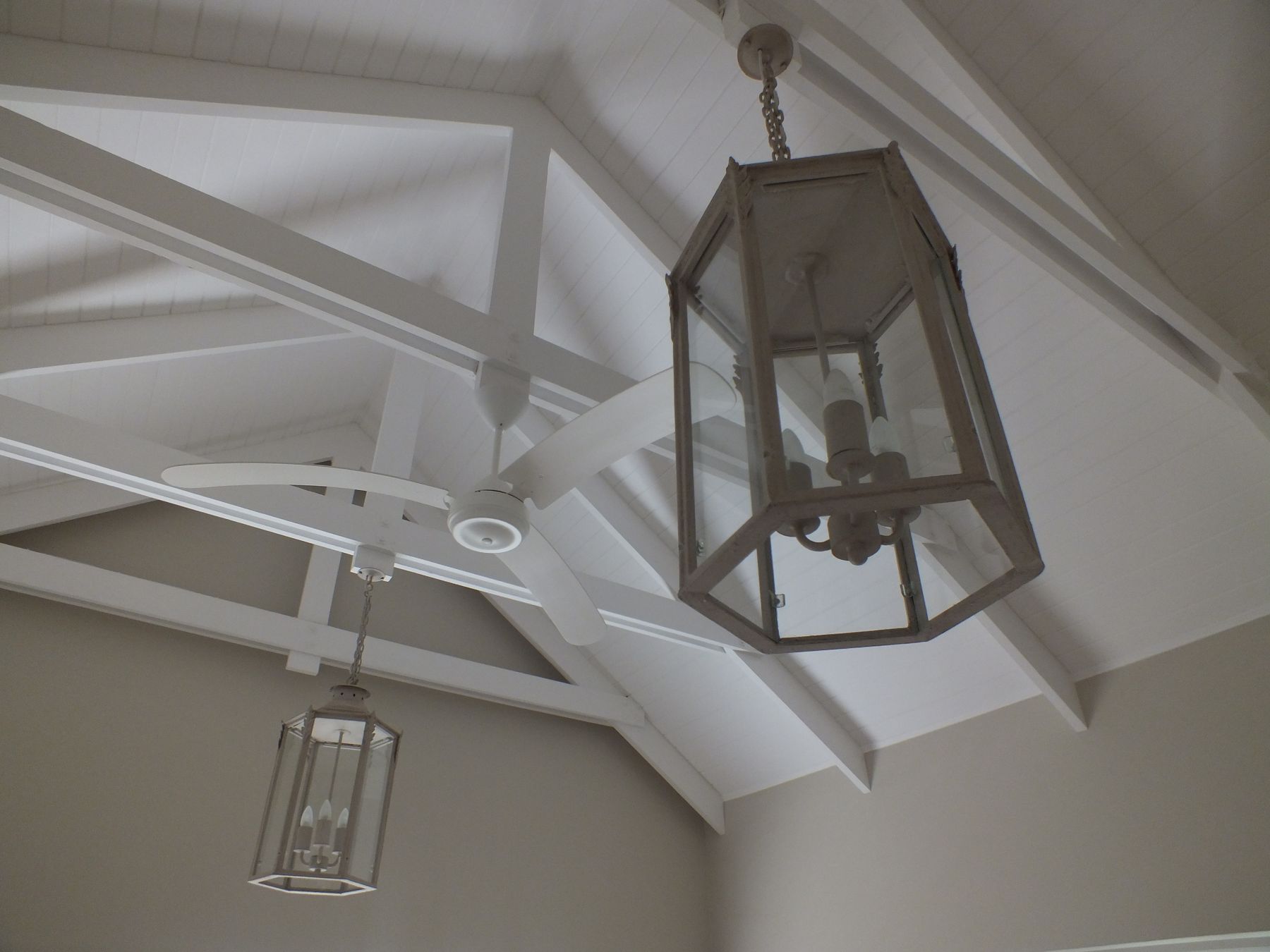 Lanterns under the boarded ceiling — New house in Simbithi